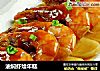 油焖虾烩年糕的做法