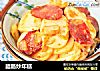 腊肠炒年糕的做法
